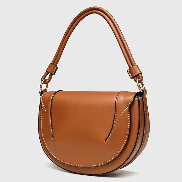 Medium PU saddle bag with magnetic clasp in black oval shape 16x24x8.5cm women's handbag