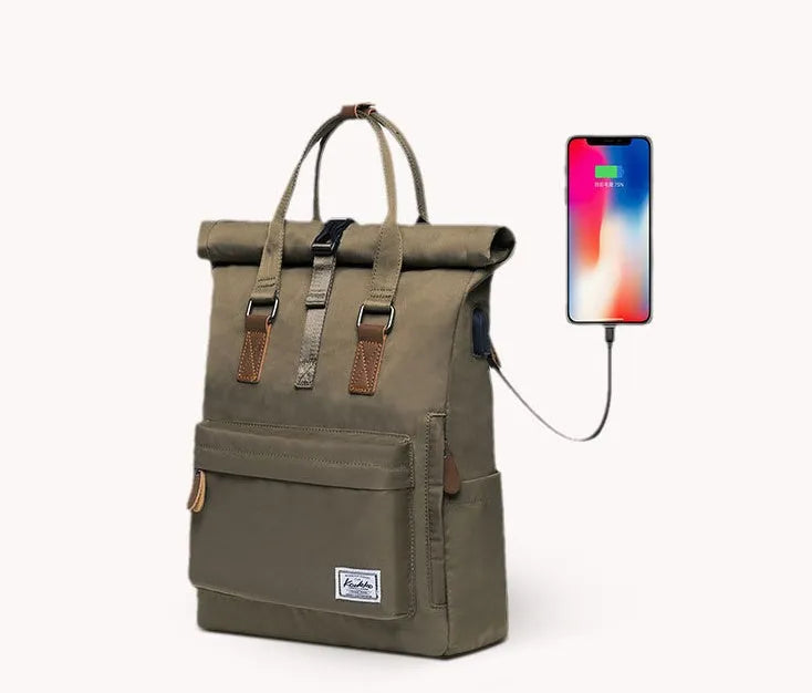 Casual polyester daypack in black showing cover opening and internal laptop pocket.