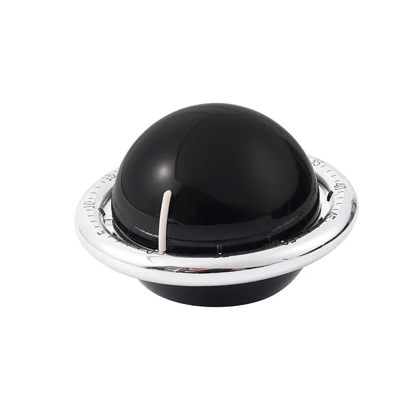 Mechanical kitchen timer in beige or black with manual twist dial and magnet backing, no battery required.