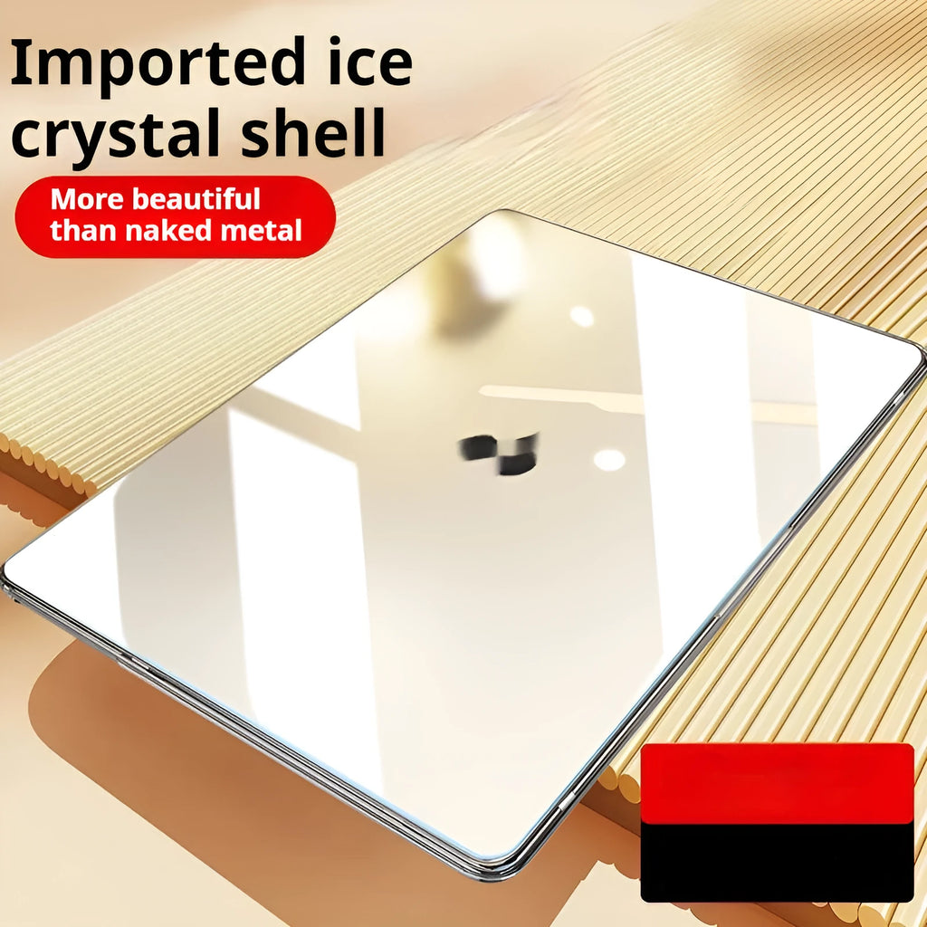 Clear hard plastic protective case for a MacBook laptop on a table.