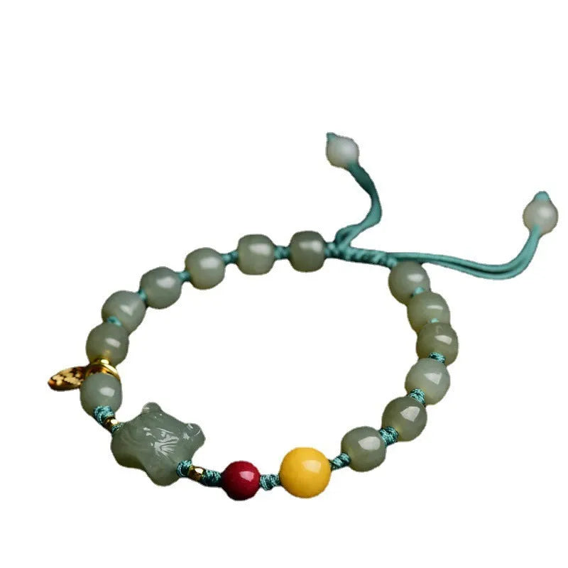 Natural Hetian Jade and cinnabar bracelet with beeswax beads and animal Zodiac charms