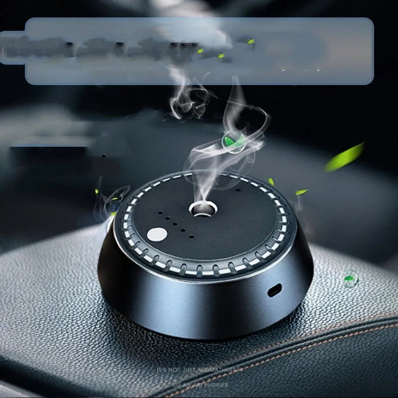 Black metal USB rechargeable car aroma diffuser showing compact size and design