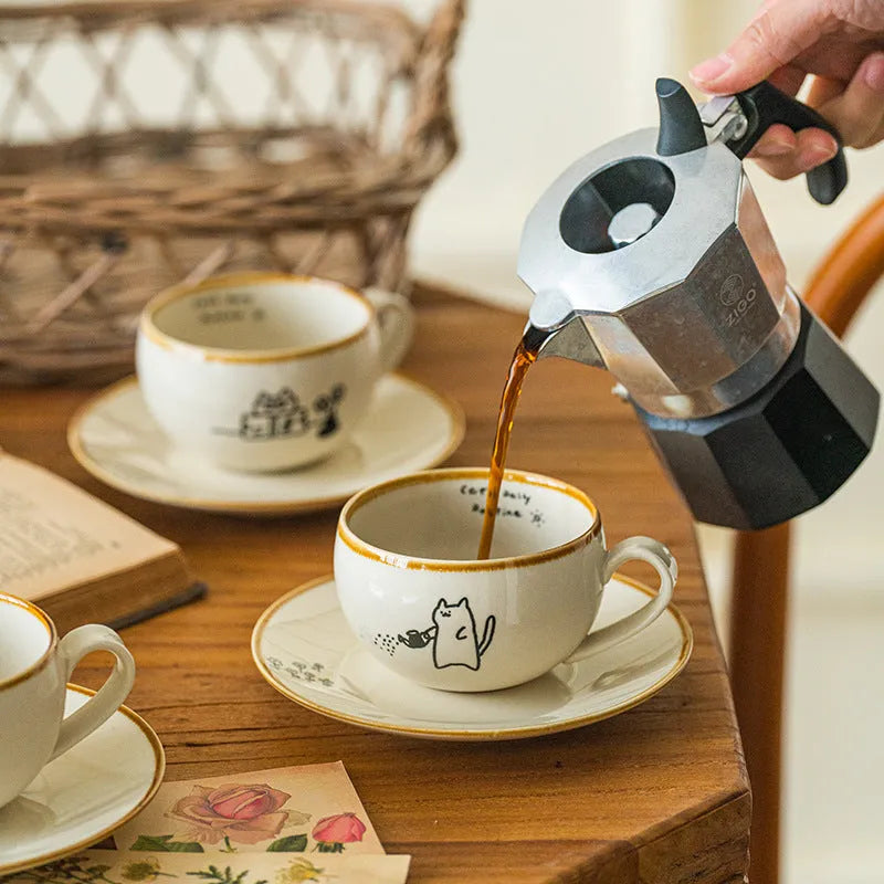 Cute Japanese cat ceramic coffee cup 250ml with healing illustration in Reading design on a table