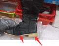 Women's black knight boots with cross strap design on artificial PU upper