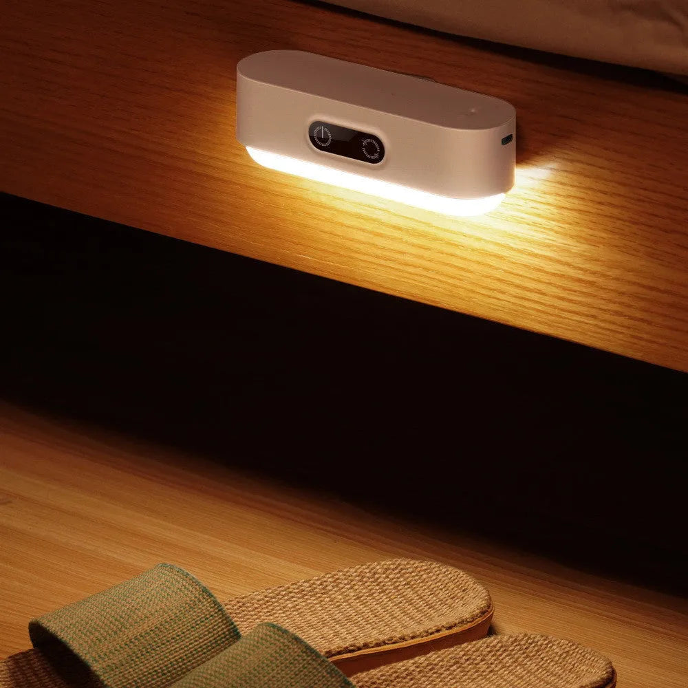 White magnetic USB rechargeable LED night light with touch buttons for dimming and colour temperature adjustment