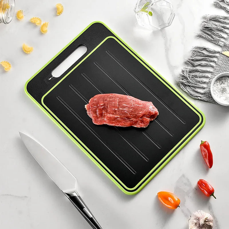 Grey square aluminium kitchen chopping board with double cutting sides, defrosting function and built-in knife sharpener