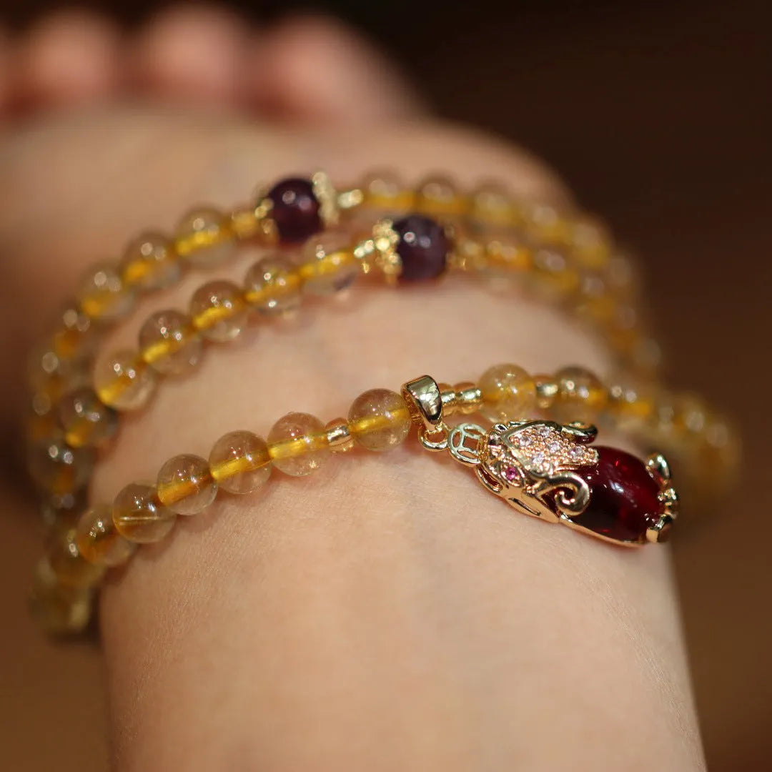 Natural Brazilian gold rutilated quartz bracelet with three-circle Chinese design and hanging chopsticks decoration