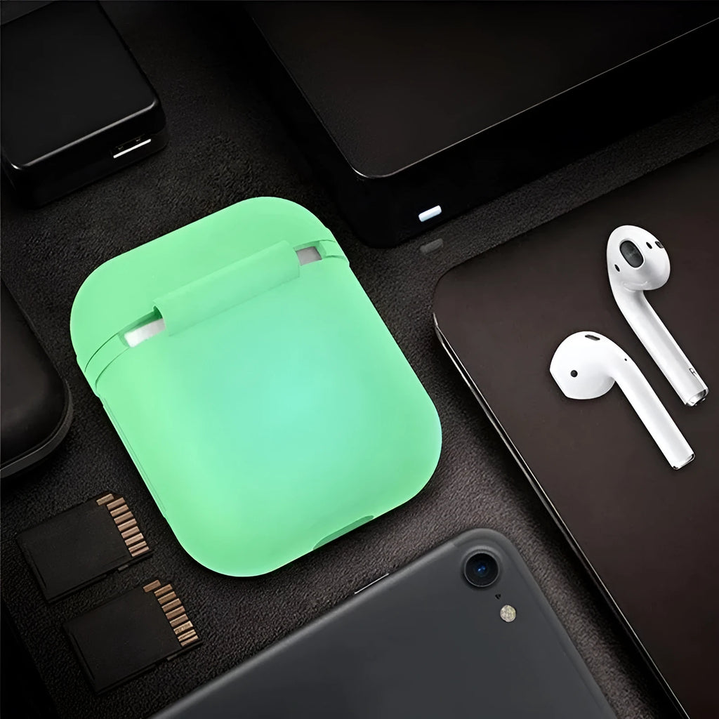Glow-in-the-dark silicone flip-top protective case for Apple AirPods in a solid luminous colour.