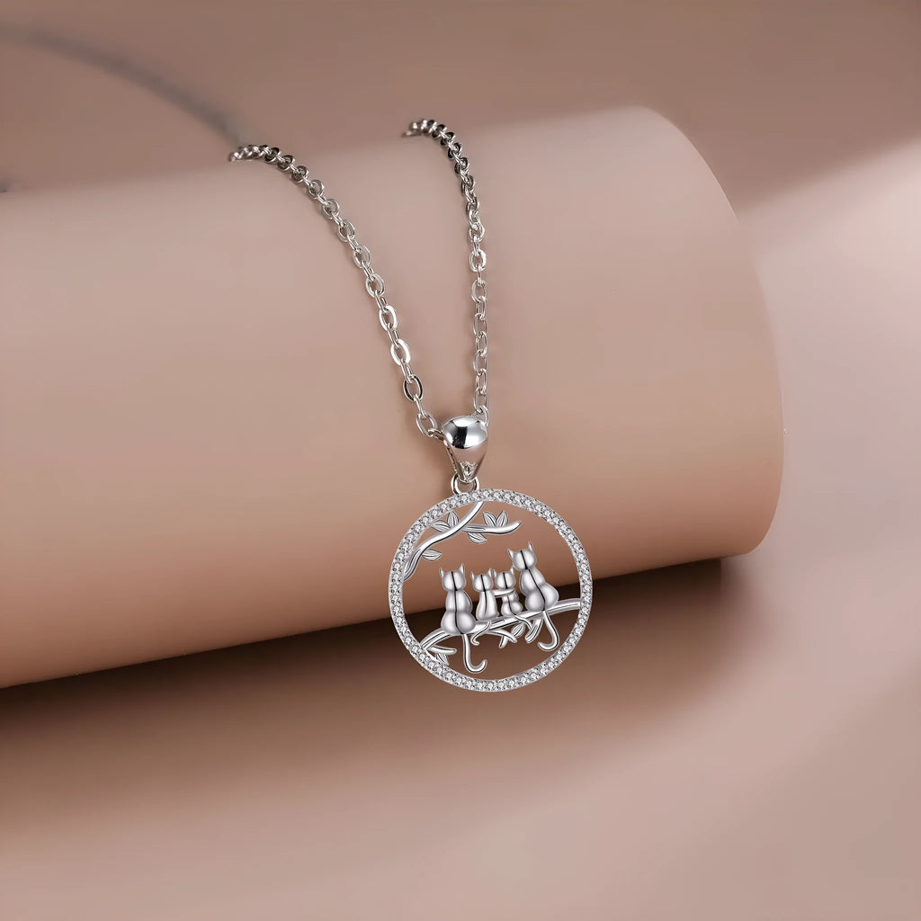 Four Kitten Necklace with copper pendant and cross chain in original design.