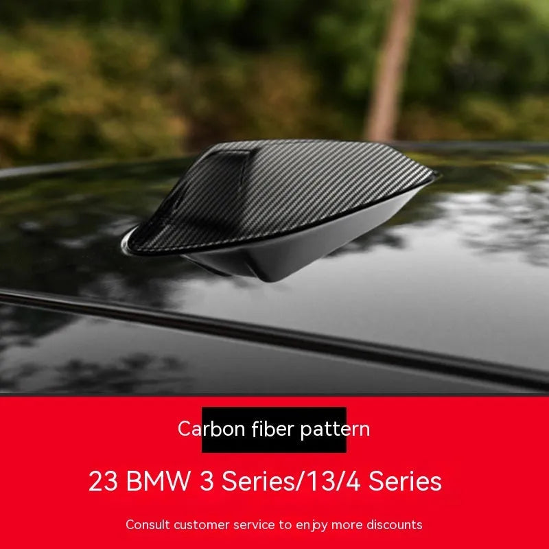 BMW shark fin antenna cover in carbon fibre pattern and piano black ABS plastic.