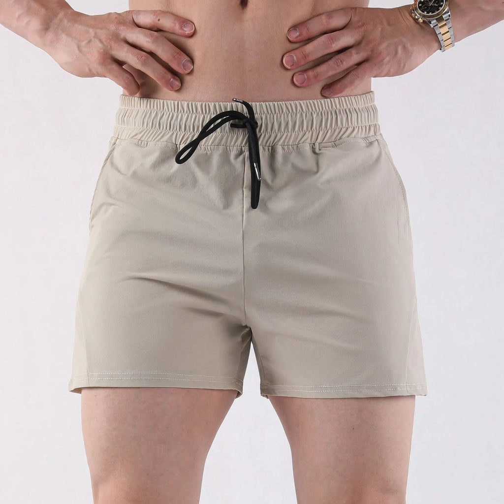 Men's thin grey polyester basketball shorts with an elastic waistband.