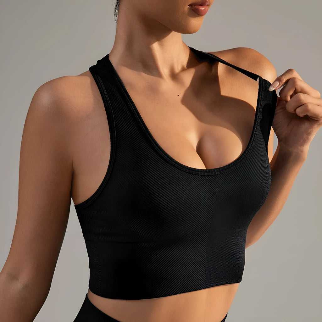 Black women's sports bra with a cross beauty back design and double shoulder straps.