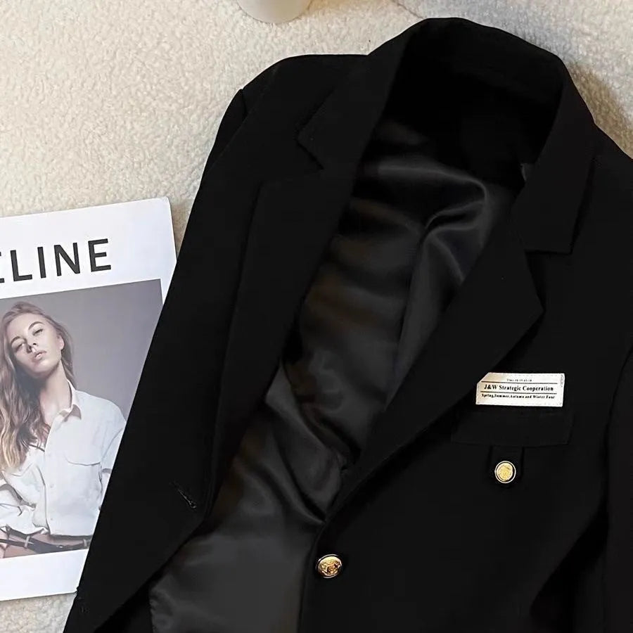 Black women's short suit coat with loose fit and long sleeves for college and commuting wear