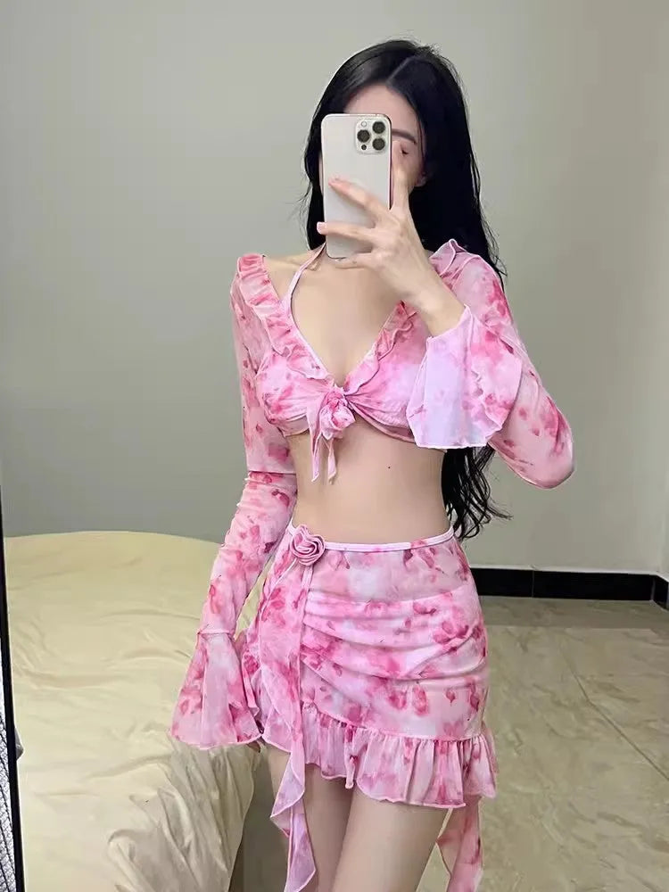 Women's cherry blossom pink floral bikini swimsuit on a mannequin