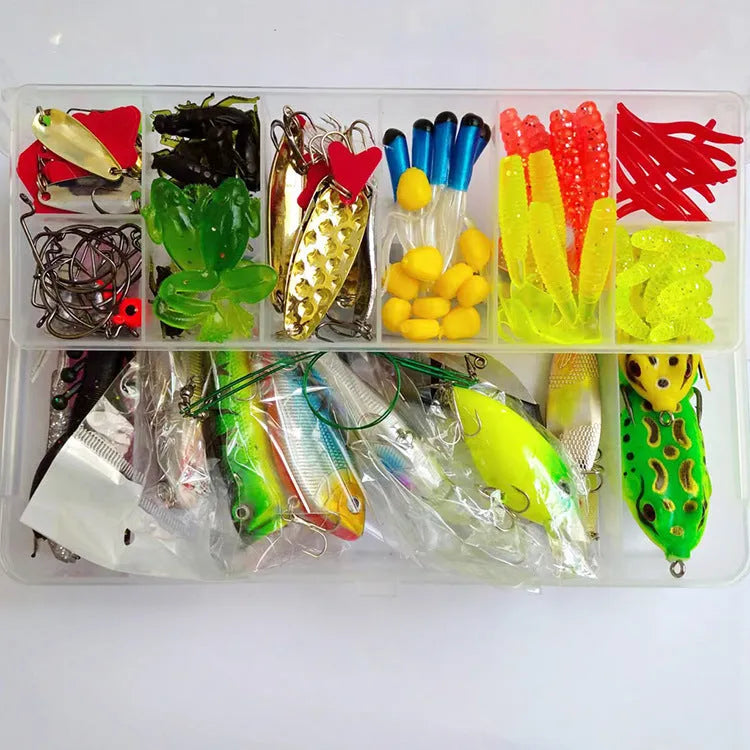 142-piece fishing lure suit with hard minnow baits, sequin spinners, and metal fishing pliers laid out on a table.