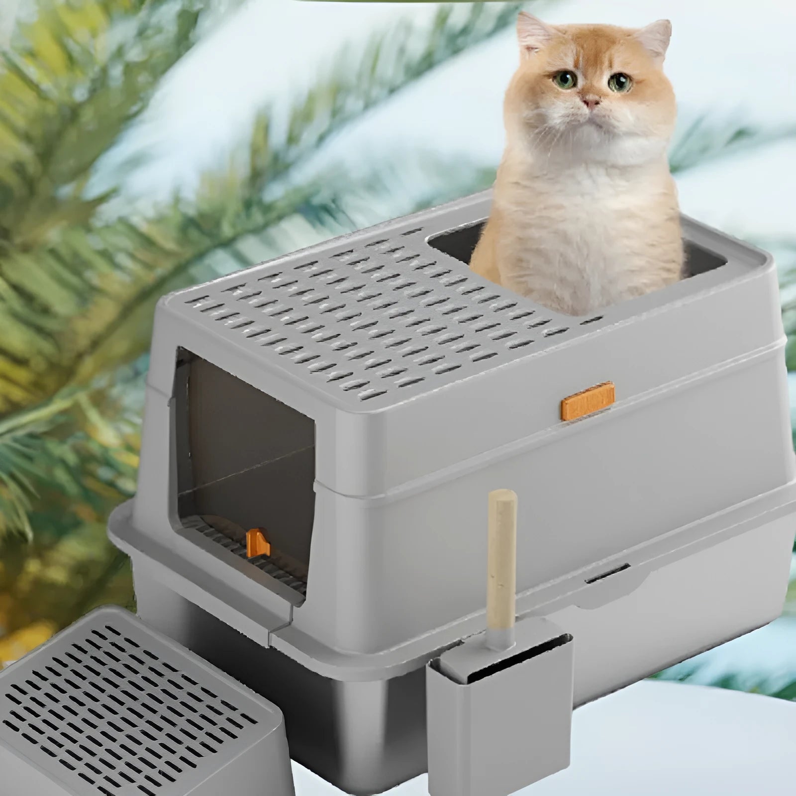 Grey stainless steel enclosed cat toilet with pedal mechanism for indoor feline use