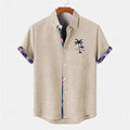 Casual loose-fit linen short sleeve shirt with a blue ocean fish pattern on the lapel.