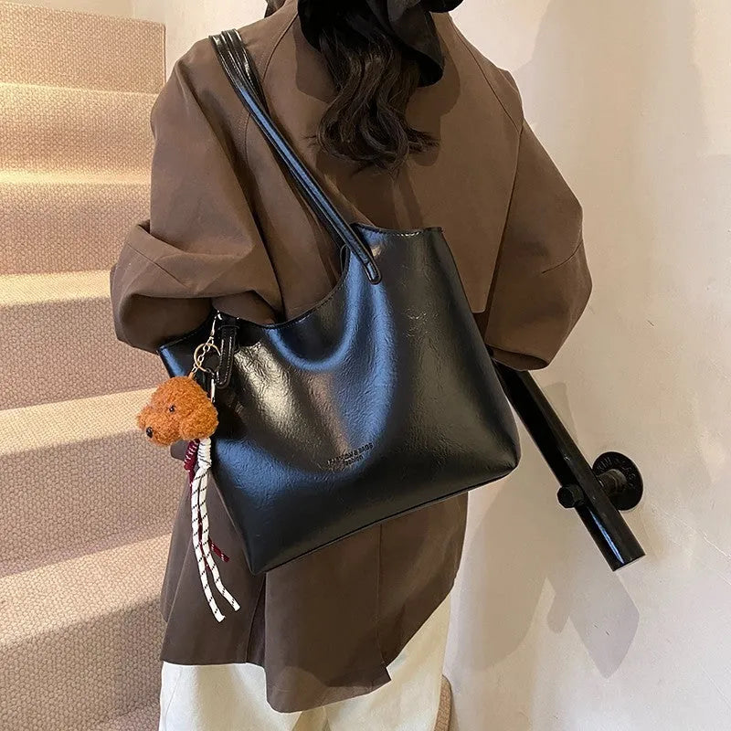 Women's PU retro commuter shoulder bag in horizontal square shape with stitching and detachable ribbon pendant