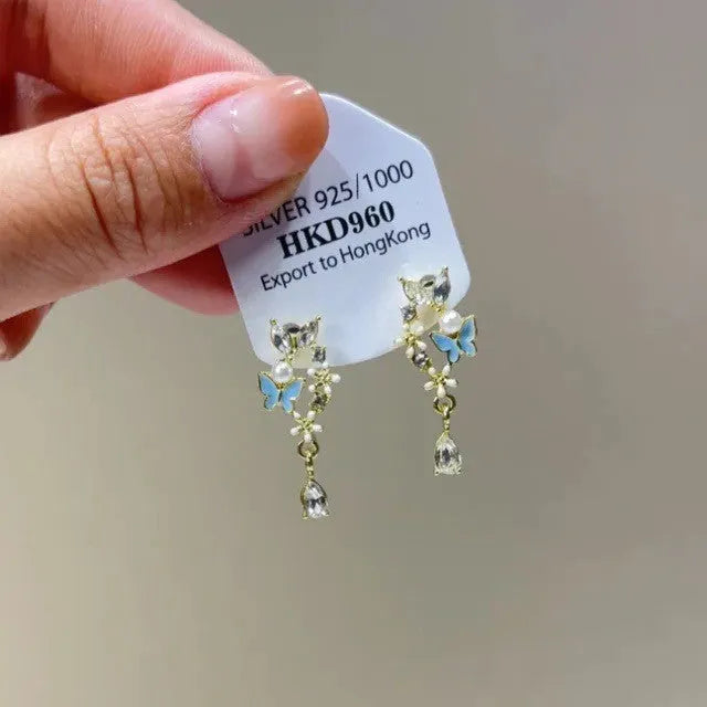 Light luxury alloy ear clip with rhinestone little stars and tassel, love/heart geometric shape, fresh style, electroplated finish