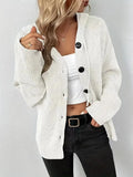 A grey thick cotton hooded cardigan sweater with a single-breasted button front and regular long sleeves.
