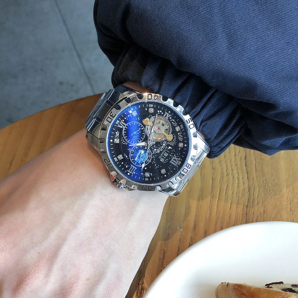 Men's silver case black dial automatic mechanical watch with luminous hands on a genuine leather strap.