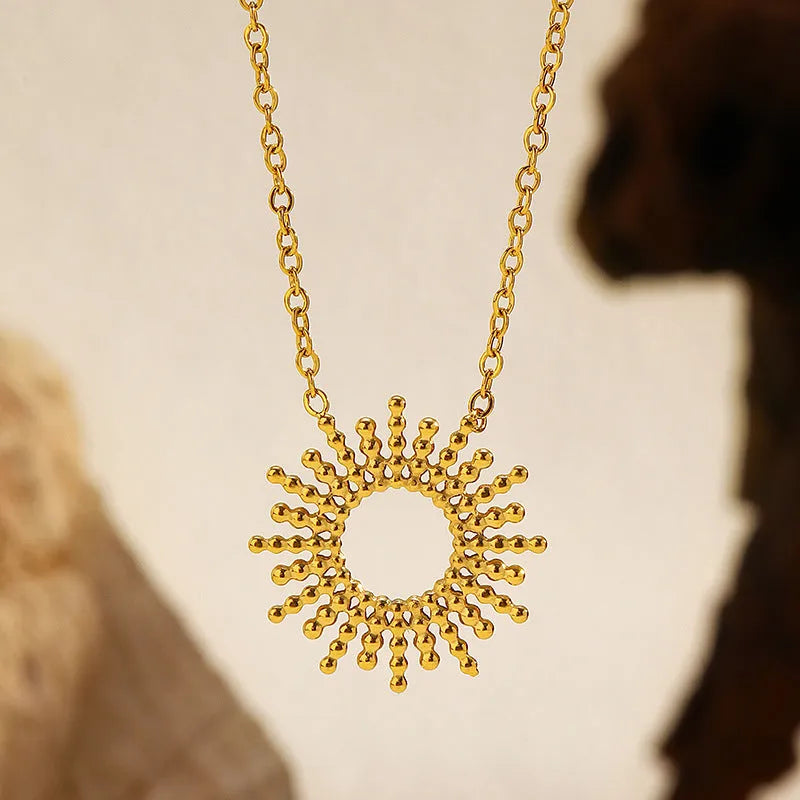 Sunflower Series women's gold necklace and bracelet set with geometric chain design.