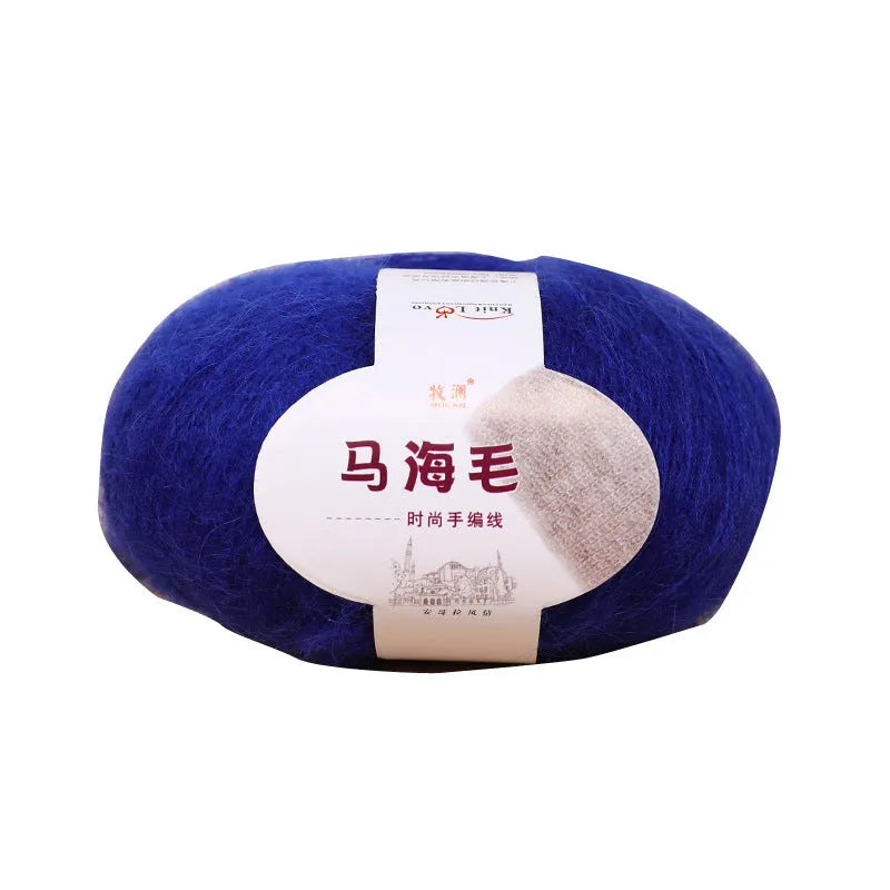 A 200g ball of mohair Inverness thread in a chosen colour, next to a measuring tape showing 180cm for the finished scarf length.