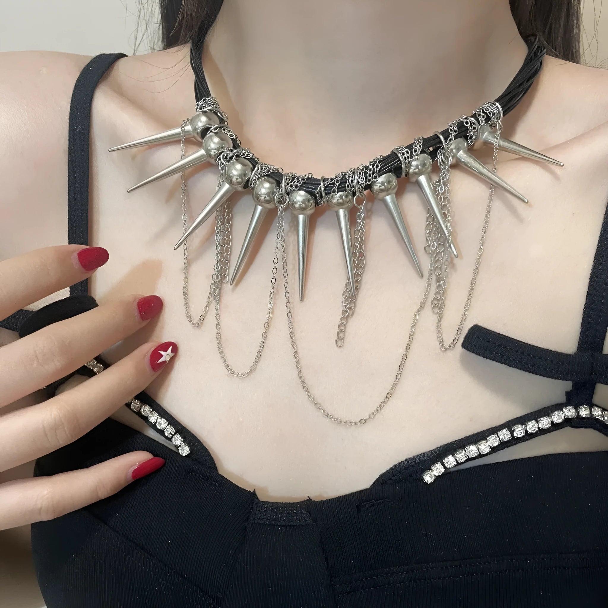 Women's leather necklace with electroplated rivet detail and winding tassel round beads design