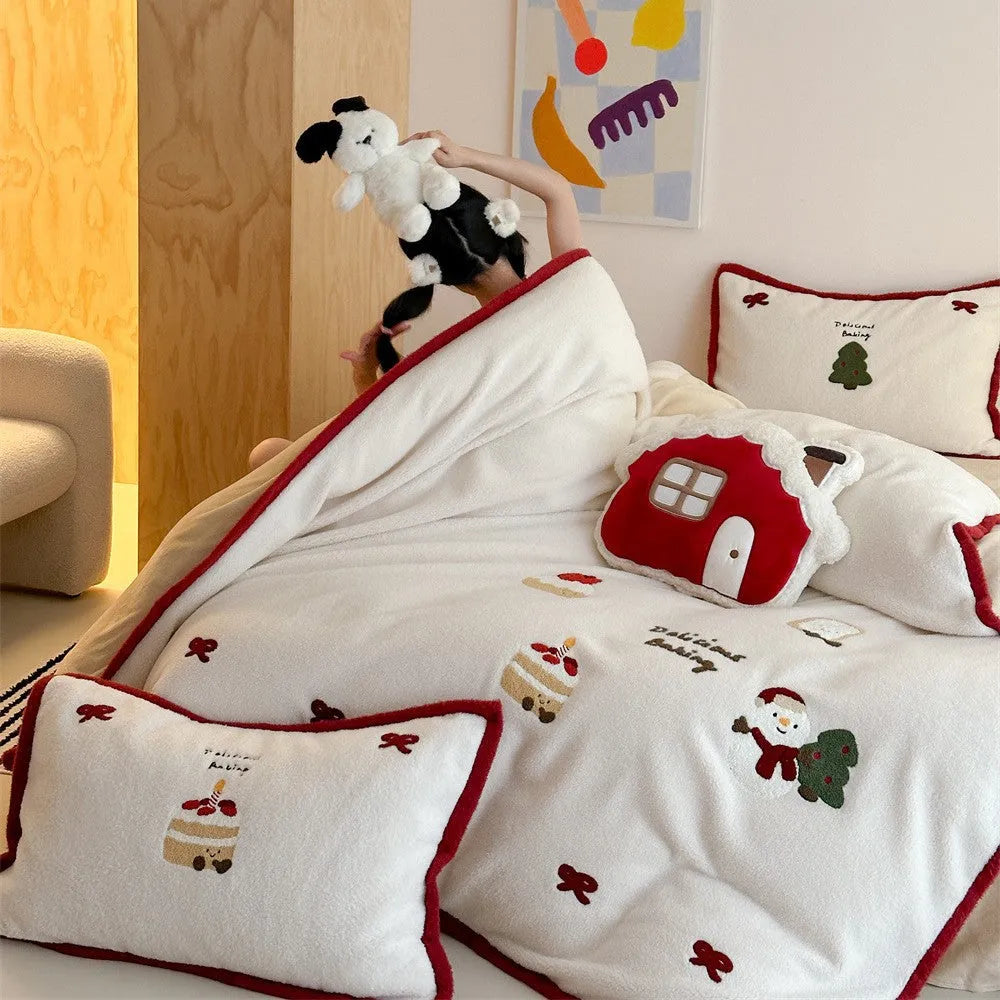 Cartoon winter Christmas themed bedding four-piece set including duvet cover, bed sheet, and two pillowcases made from polyester.