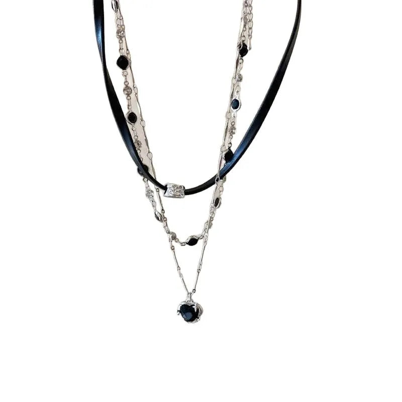 Women's multi-layer heart necklace with adjustable chain, alloy pendant, and artificial crystals.