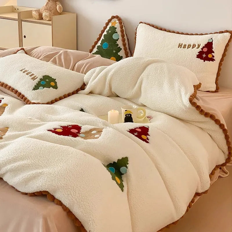 Bright yellow Christmas tree fleece-lined duvet cover set with embroidery on a bed.