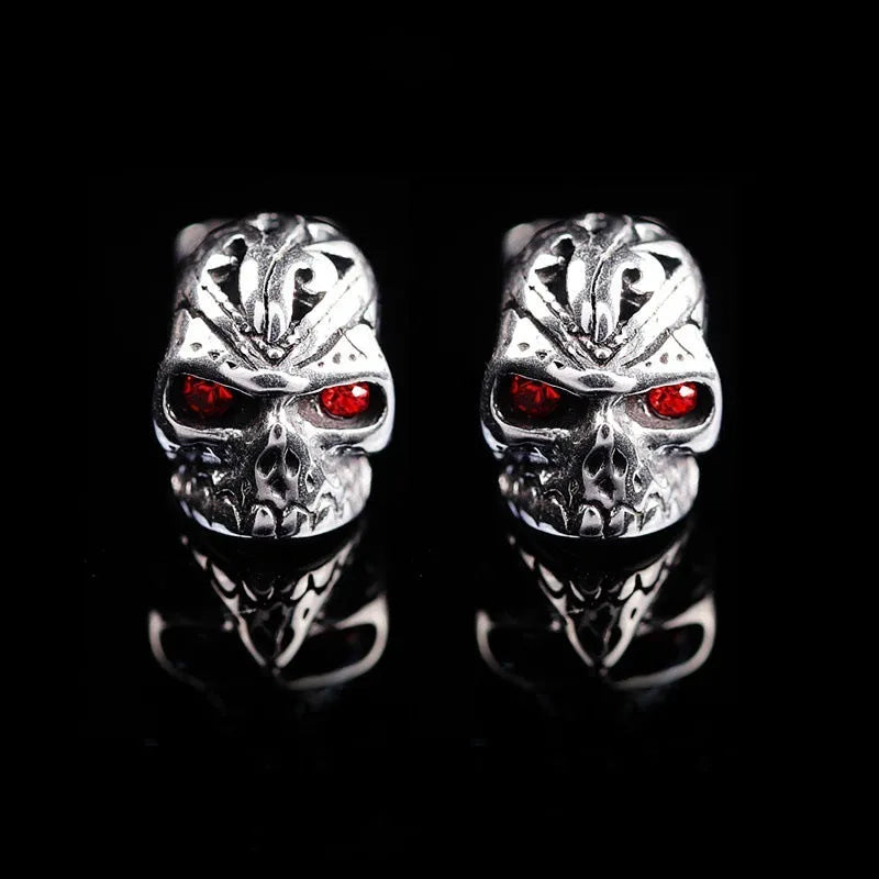 Skull stud earrings with red eye ghost head design and artificial gemstone inlay detailing