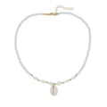 White conch shell bead necklace with a mother of pearl pendant on a regular chain.