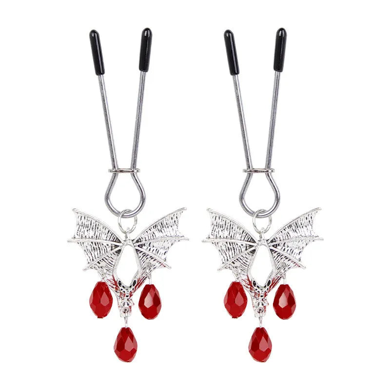 Silver alloy bat nipple clamp with adjustable tension and ruby detailing