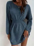 Blue women's knitted dress with crocheted flowers, a round neck, fitted waist, and long sleeves.