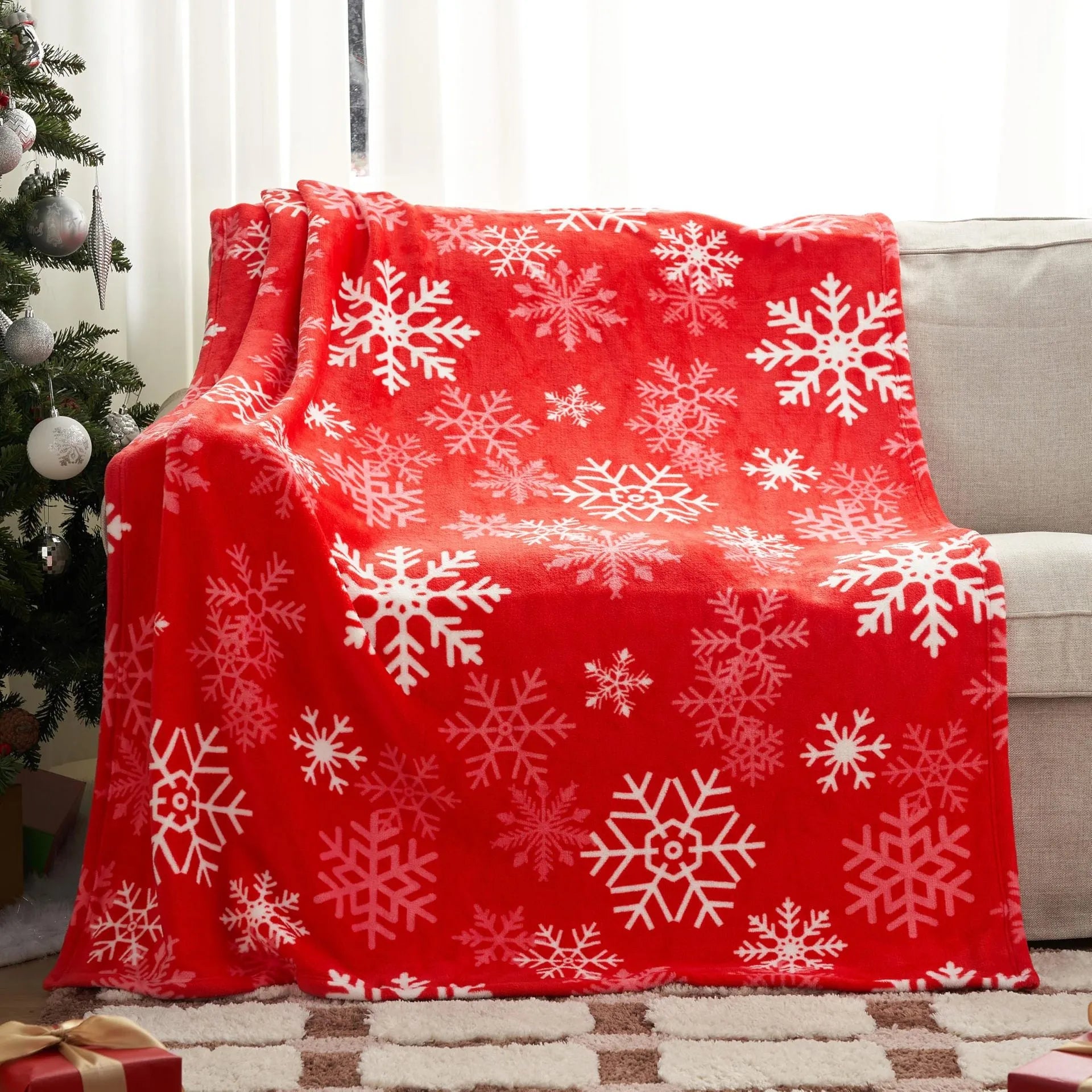 Soft flannel Christmas throw blanket in a choice of colours, folded to show texture.