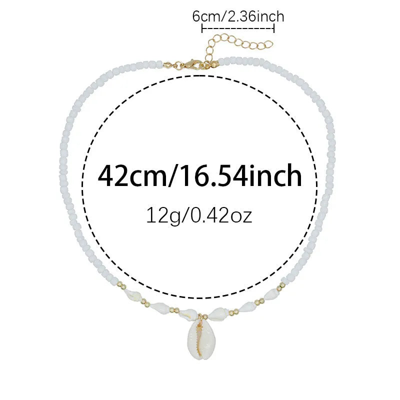 White conch shell bead necklace with a mother of pearl pendant on a regular chain.