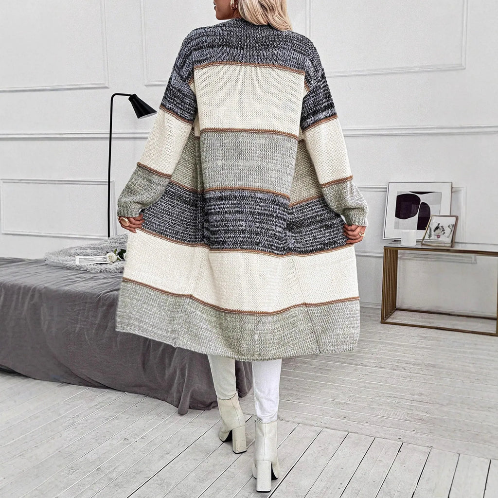 Grey striped knitted cardigan with long sleeves and loose fit street fashion style
