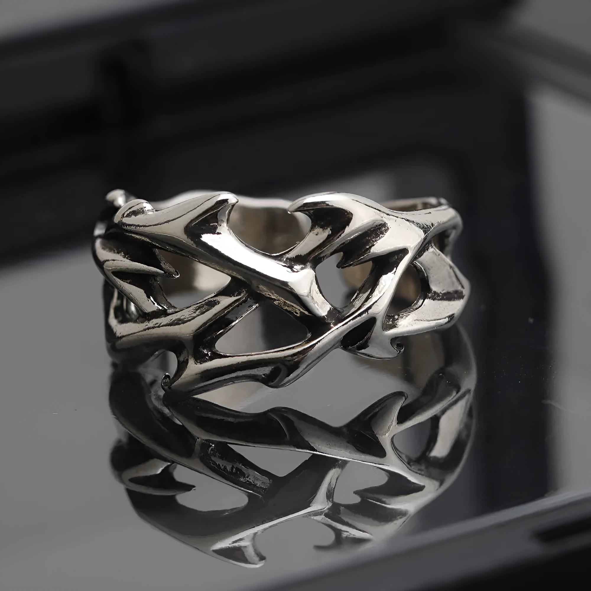 Copper men's ring with geometric thorn flower design and adjustable opening in J2150 thorns colour.