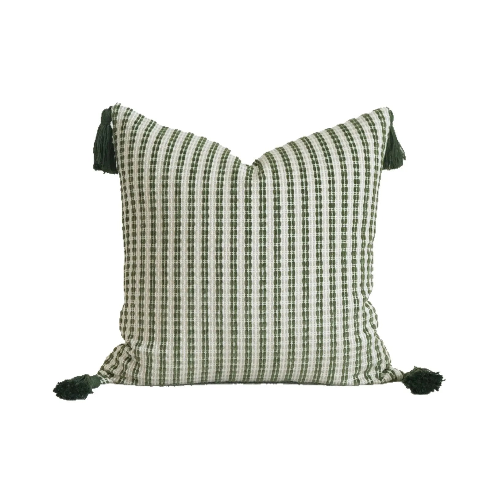 Green cotton linen decorative pillow with tassel, featuring a botanical leaf pattern, for hotel sample rooms.