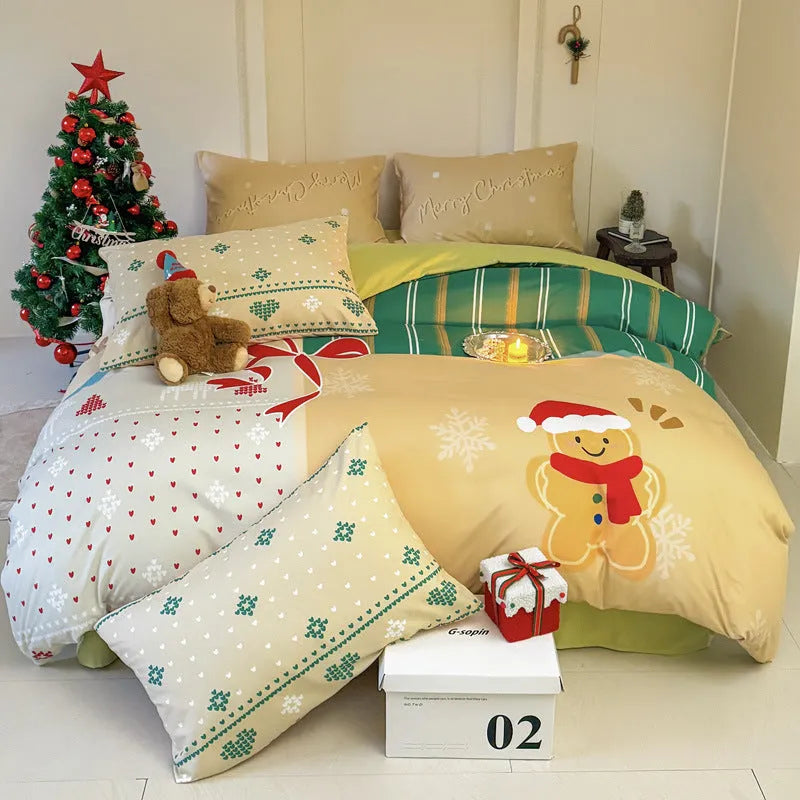 Christmas cartoon print bedding four-piece set on a bed, showing duvet cover and pillowcases in a festive pattern.