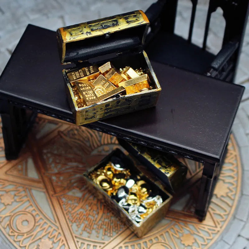 Miniature alloy gold coin and bar treasure box doll house accessories set.
