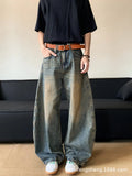 Men's distressed denim jeans in retro blue colour with wide-leg design and mid-waist fit