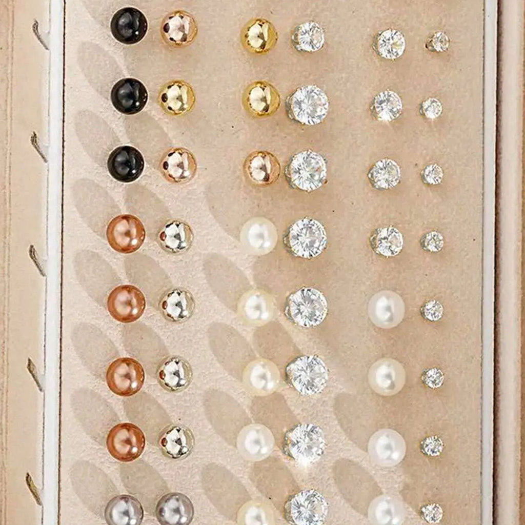 Assortment of 108 gold and yellow geometric alloy earrings with round pearl-like details on a white background.