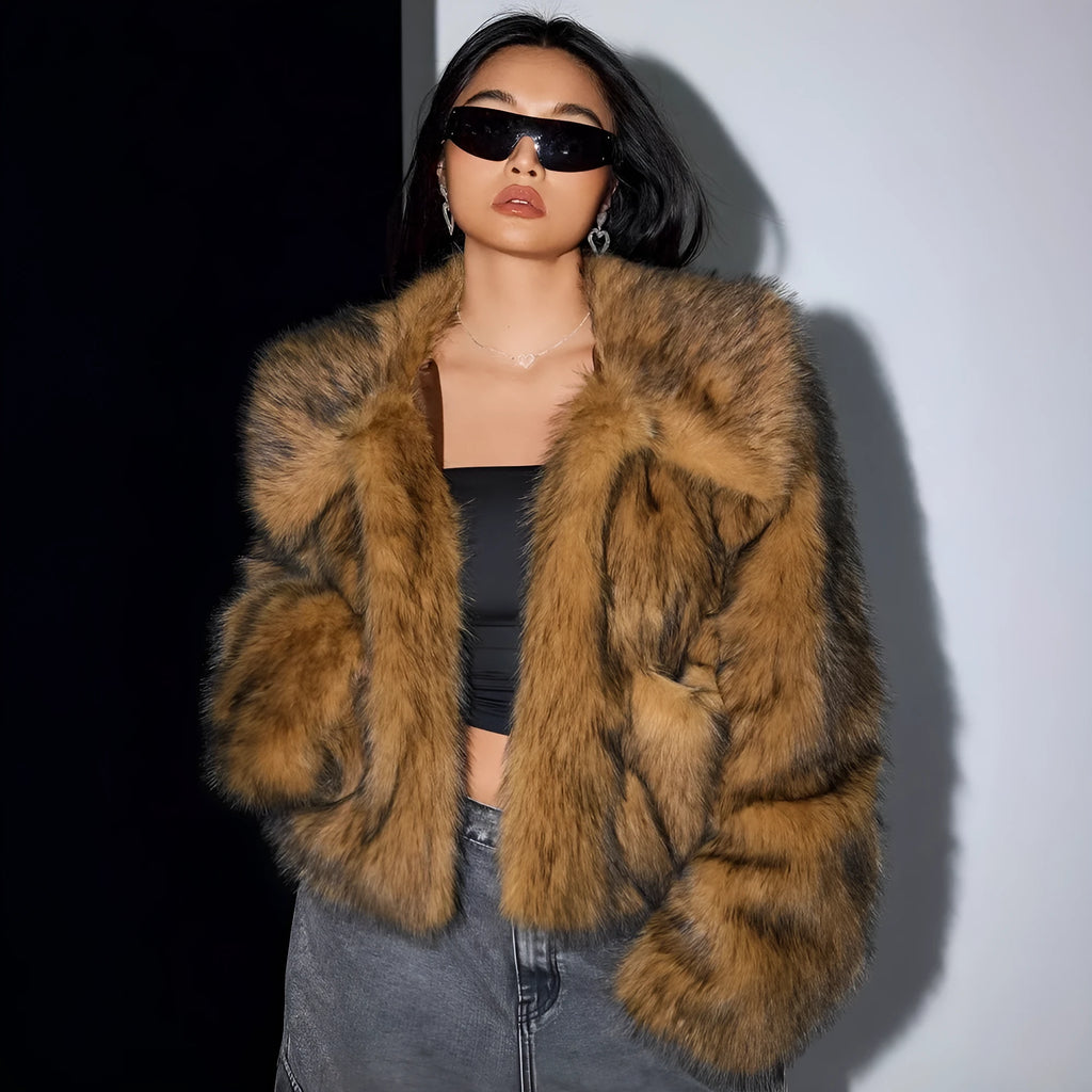 Women's short black tip artificial fur winter coat with a large fur collar and long sleeves.