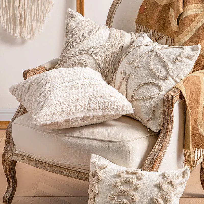 Knitted cushion cover with tassel edge detailing showing stripe pattern and pp cotton filler
