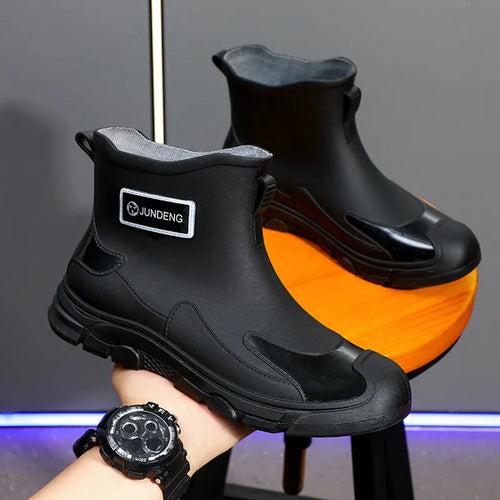 Adult waterproof wading boots with PVC rubber upper and integrated plastic sole in minimalist Korean style