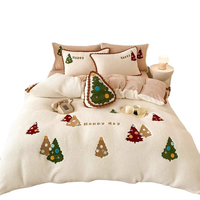 Bright yellow Christmas tree fleece-lined duvet cover set with embroidery on a bed.