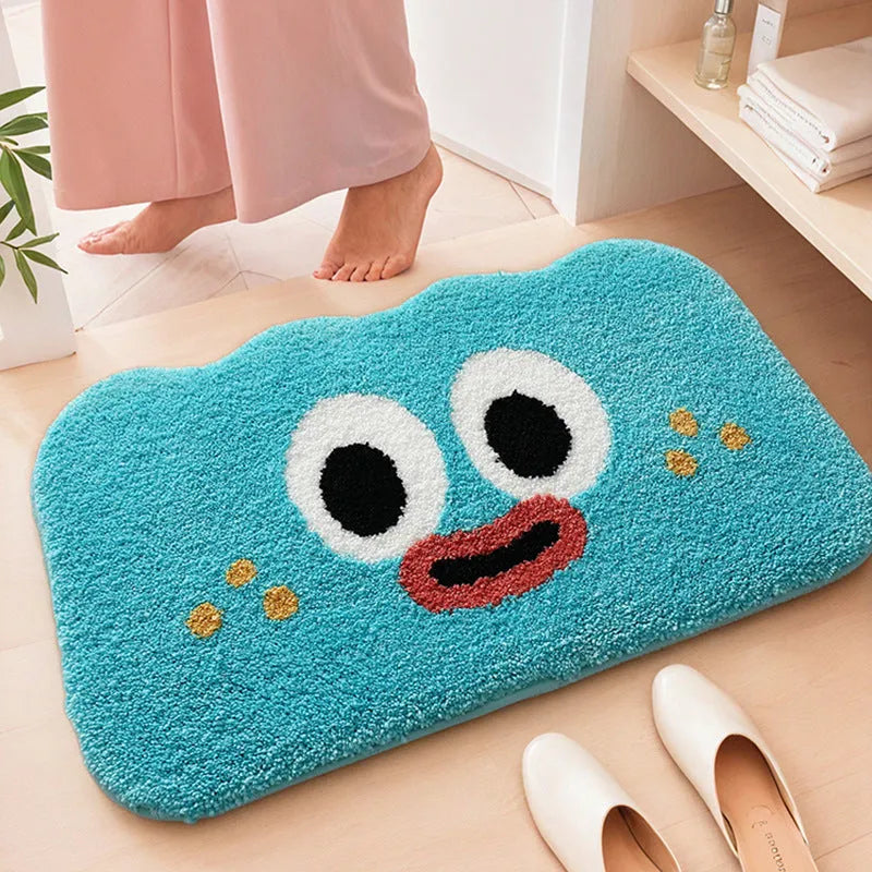 Cartoon anime print bathroom floor mat in soft polyester fibre, shown in green colour.