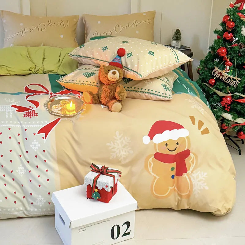 Christmas cartoon print bedding four-piece set on a bed, showing duvet cover and pillowcases in a festive pattern.